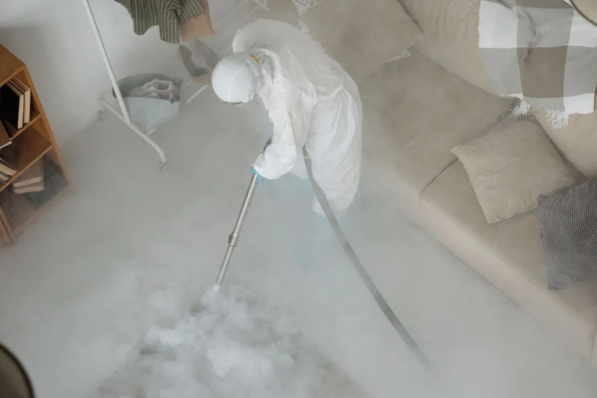 Biohazard cleanup technician in protective equipment, Mauldin, SC